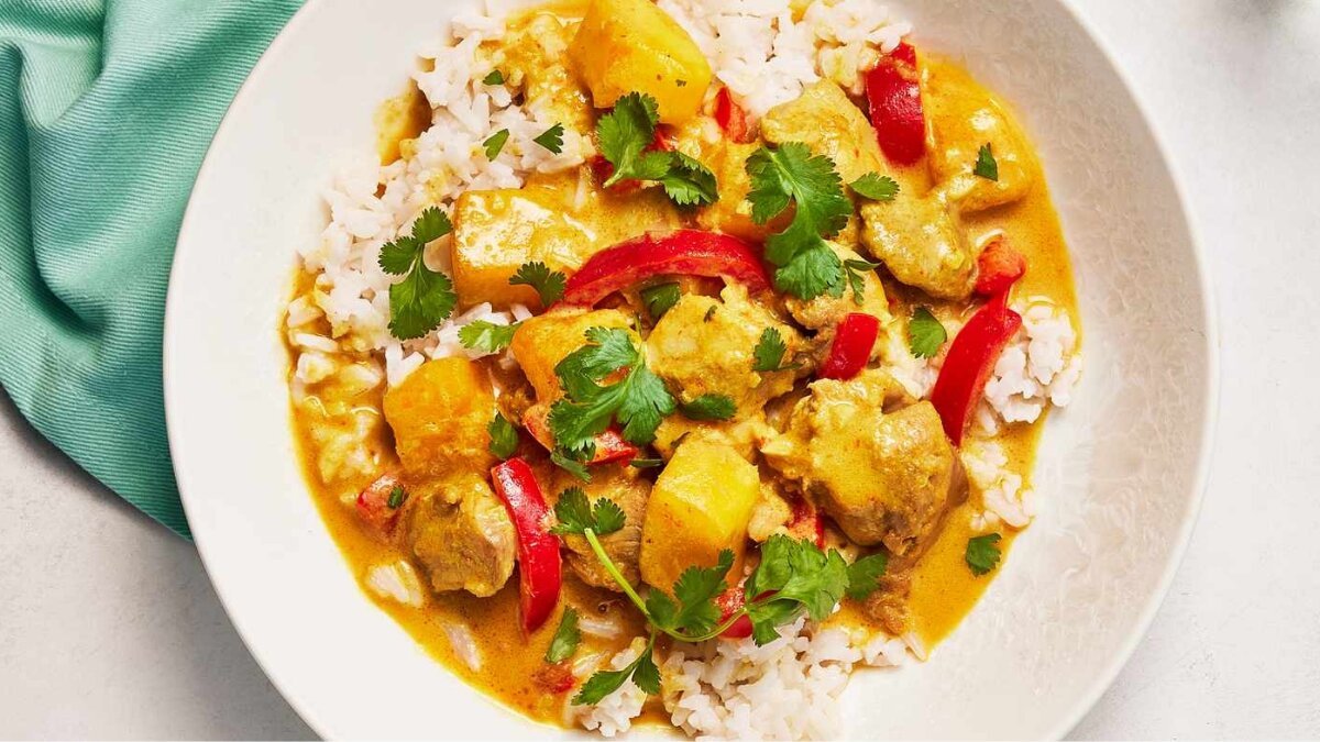 Cook creamy mango coconut chicken curry in 5 comforting steps
